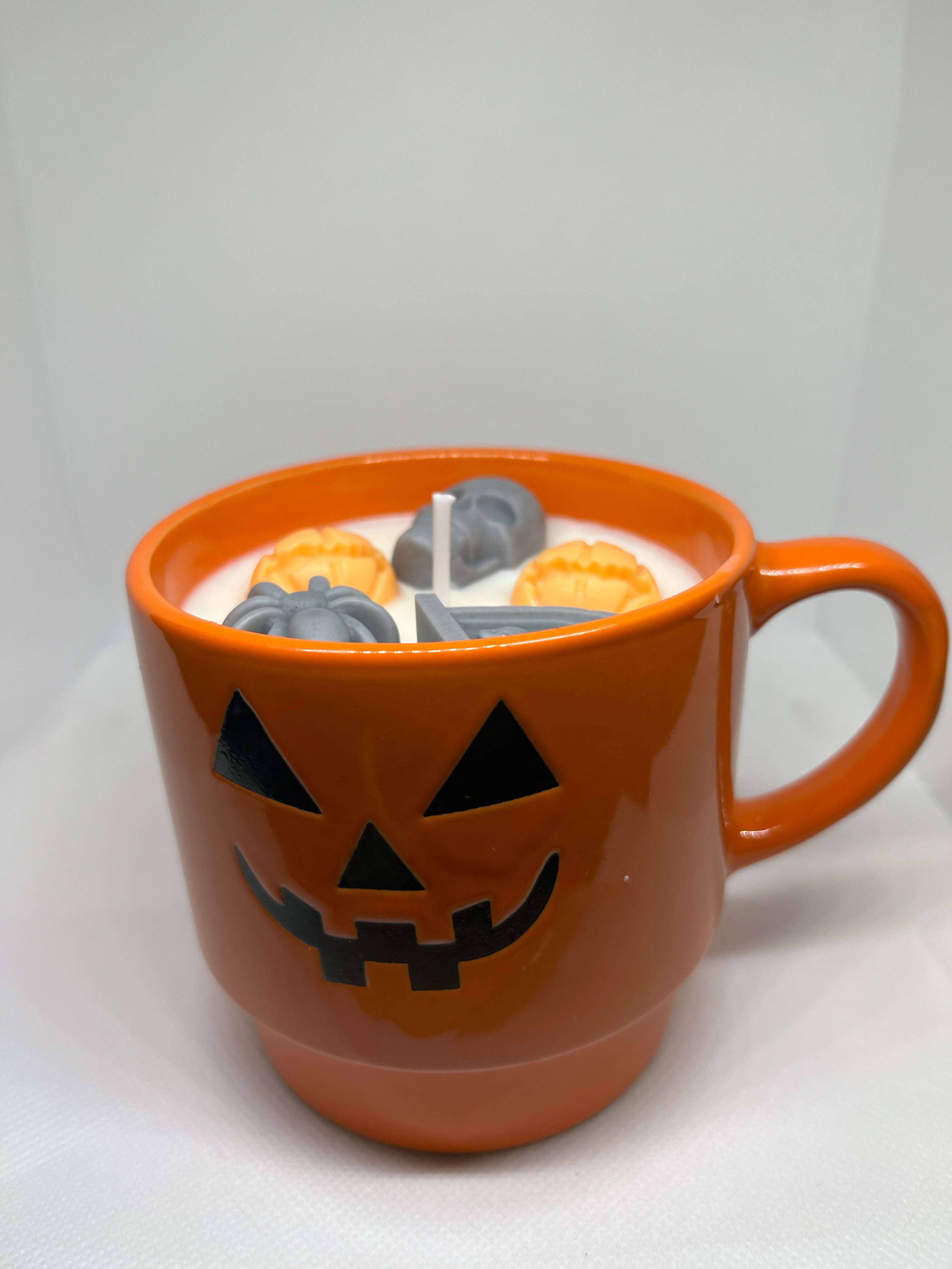 Halloween candle in Spooky mug with cinnamon and pumpkin pie scent and spooky accents